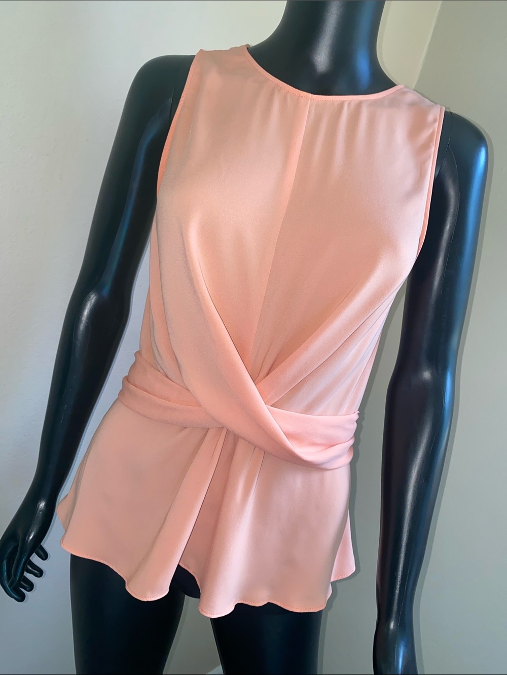 Naked Zebra Peach Twist-Front Sleeveless Peplum Top